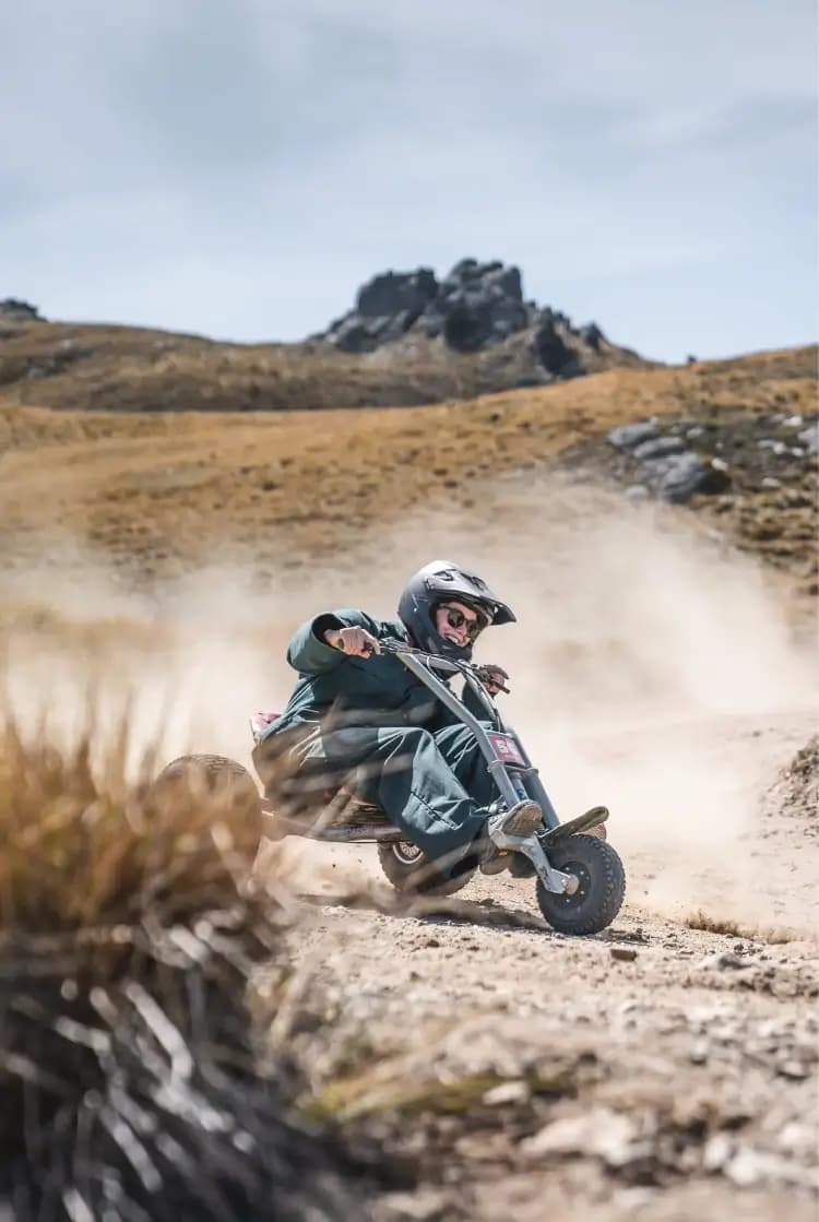 Experience the thrill of off-road mountain carting on rugged terrain with stunning mountain views. Perfect for adrenaline seekers and adventure lovers alike!